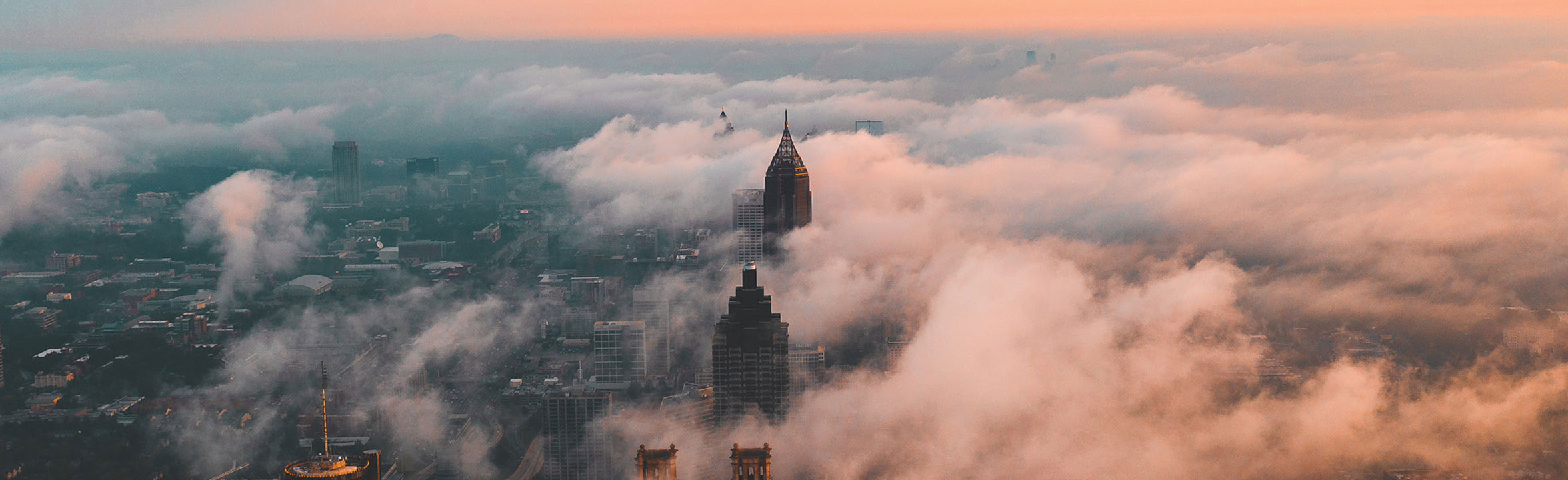 Buildings below the clouds